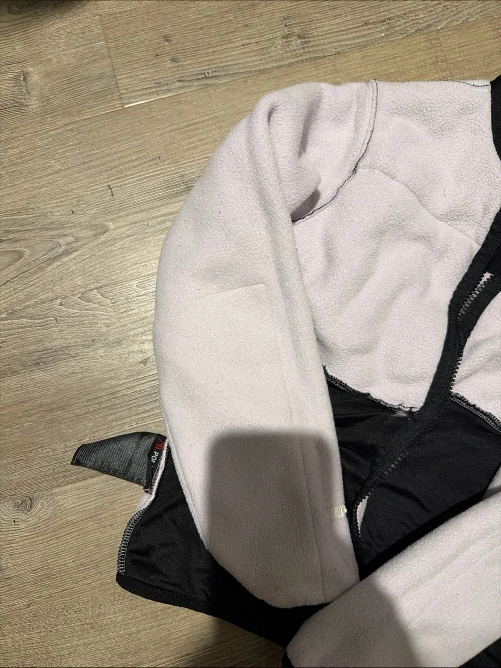 The North Face Kids Light Pink and Black Fleece Jacket